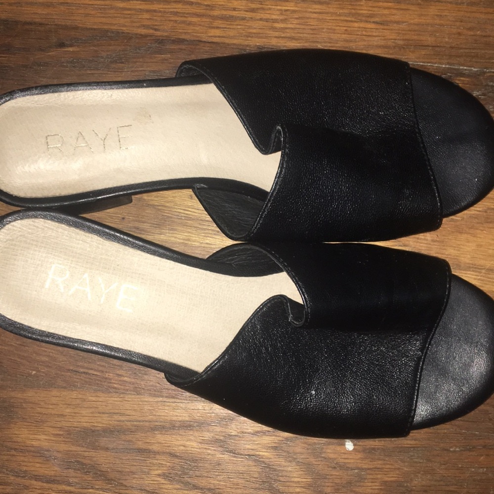 Small heeled black leather slides